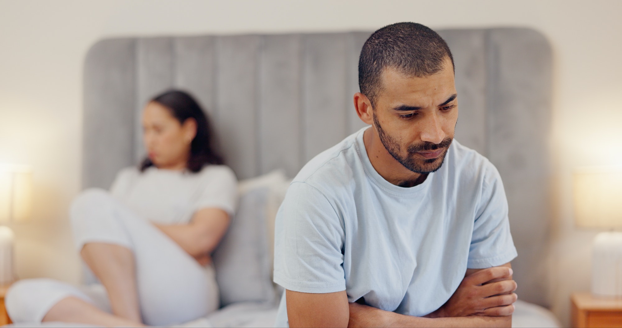 Frustrated couple, bed and breakup in fight, conflict or disagreement from argument or divorce at h