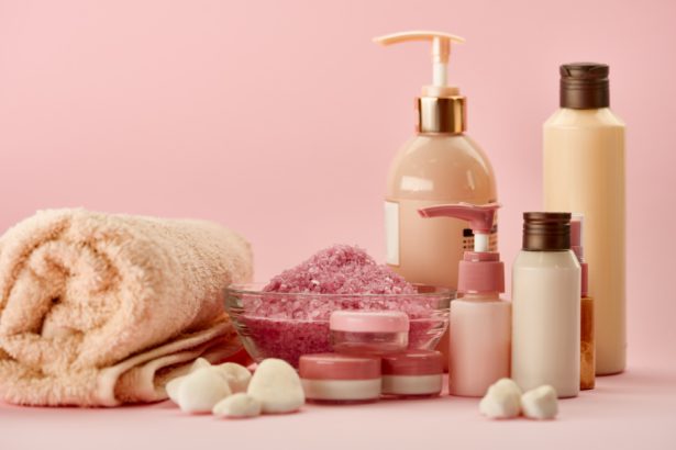 Skin care products on pink background, nobody